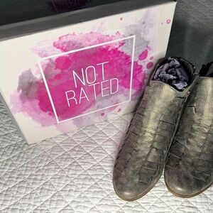 BRAND NEW “Not Rated” women’s size 9 booties. Color is Pewter.